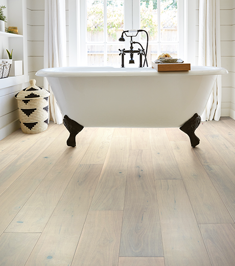 bathroom with hardwood floor from Anderson Tile & Carpet in Anderson, SC